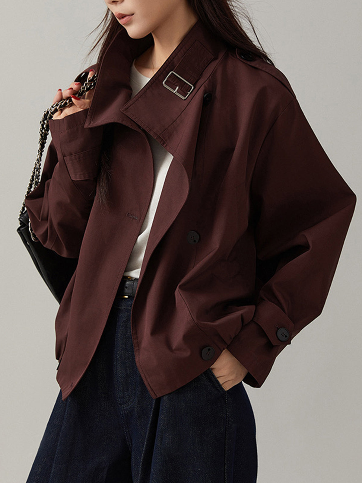 Edmee Maroon cropped jacket, close-up of the wide pointed lapels and chest flap pocket