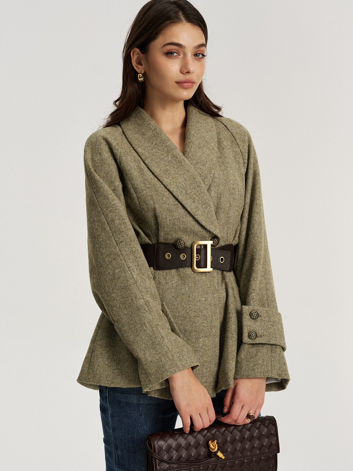 Emilienne green belted wool-blend jacket, angled side view showing sleeve cuff buttons
