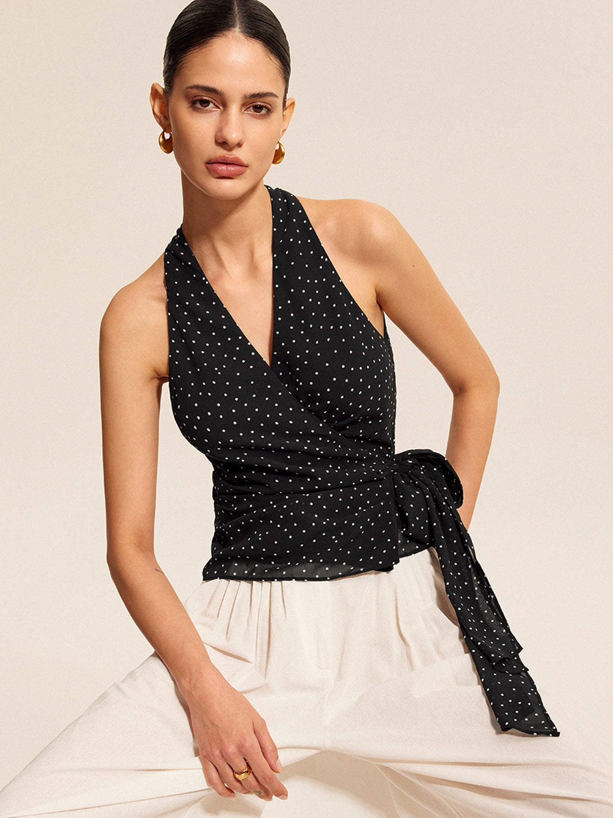 Estelle black polka dot halter top, front view
