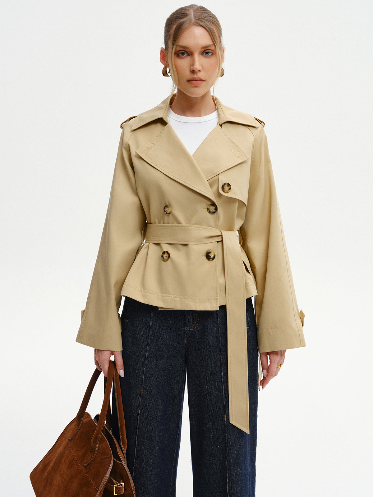 Khaki double-breasted trench jacket buttoned and belted, front view