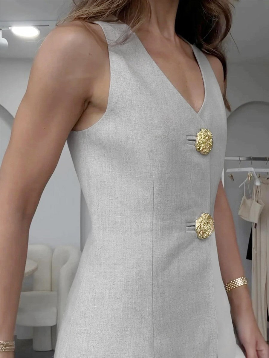Flavie stone waistcoat and trouser set, side view of the two gold bar-loop buttons