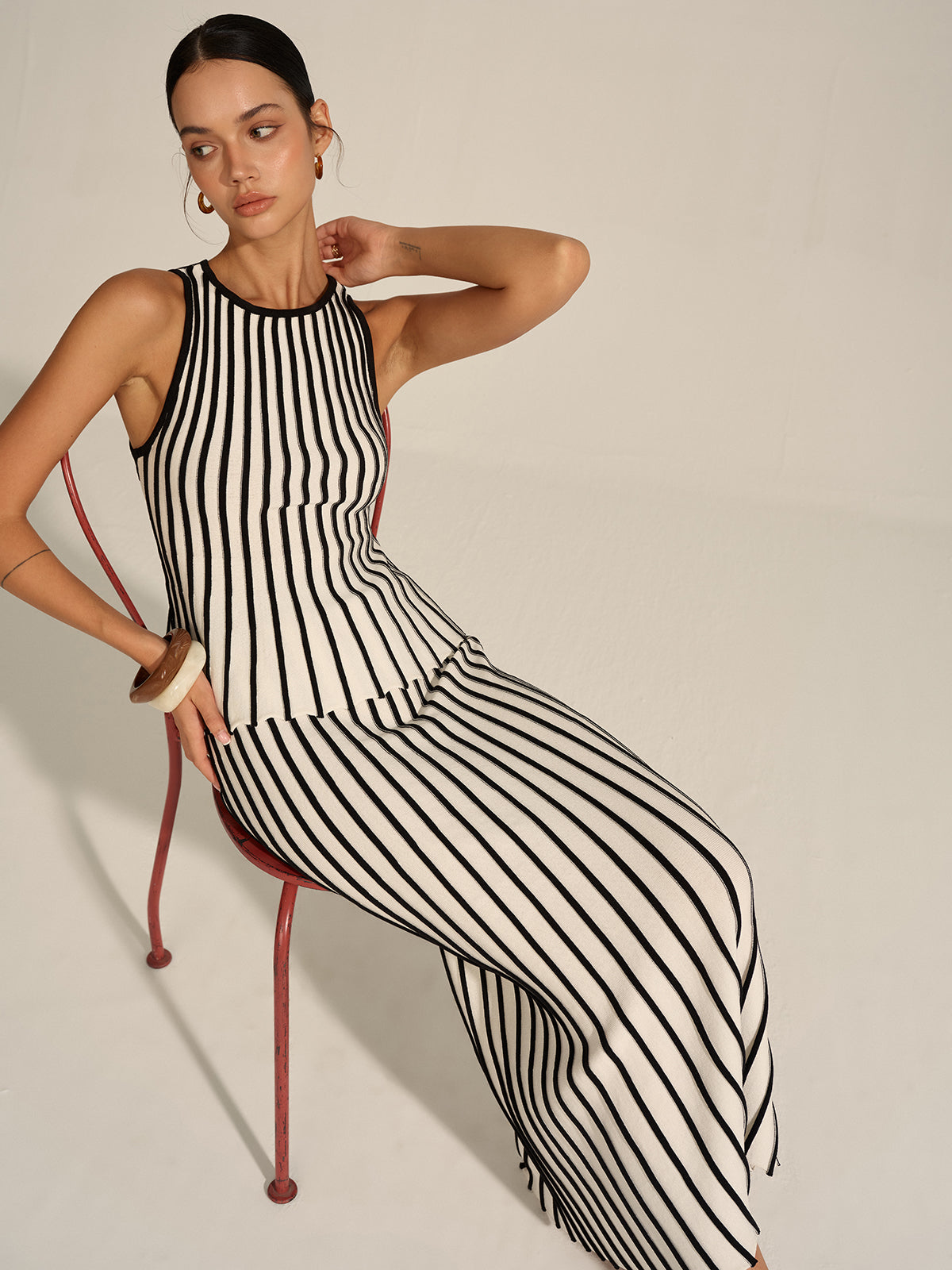 Gaelle black and cream striped knit top and maxi skirt set, seated view