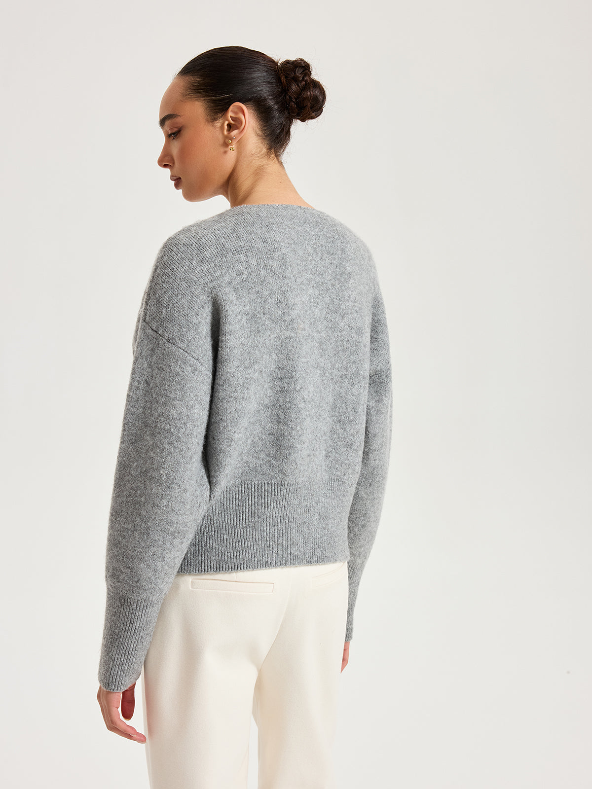 Genevieve gray asymmetric gold-button cardigan, back view