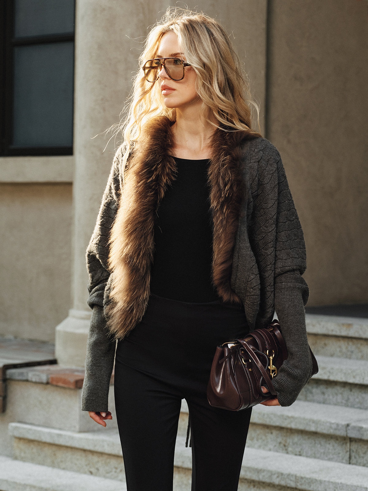 Georgette gray knit jacket with faux fur collar, standing front view cropped at the thigh