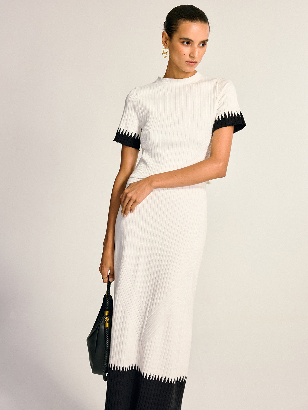 Gwenaelle white and black knit top and midi skirt set, three-quarter front view