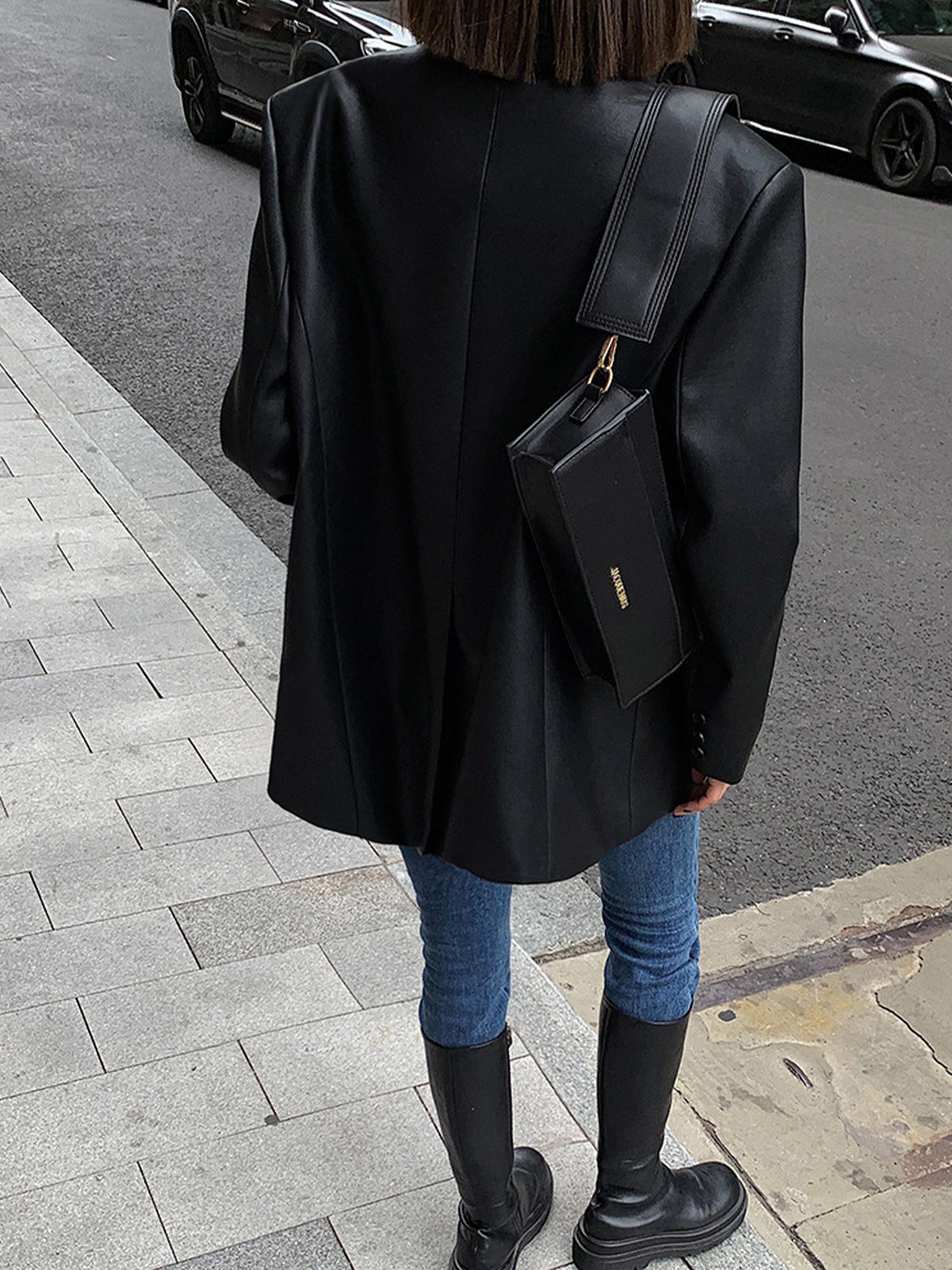 Huguette Black oversized blazer, back view with the cuff vent buttons