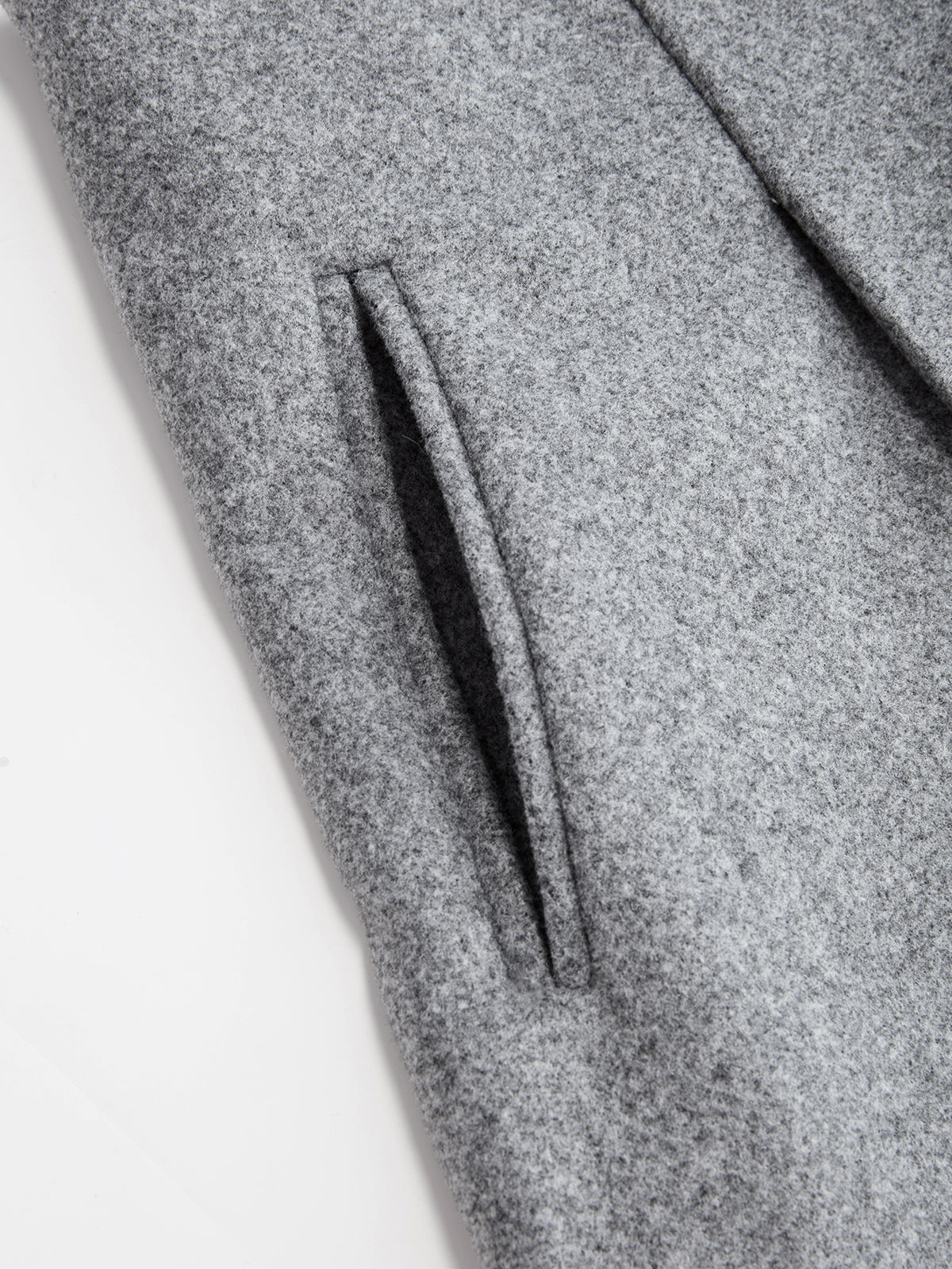 Justine gray tailored blazer, close-up of a welt pocket