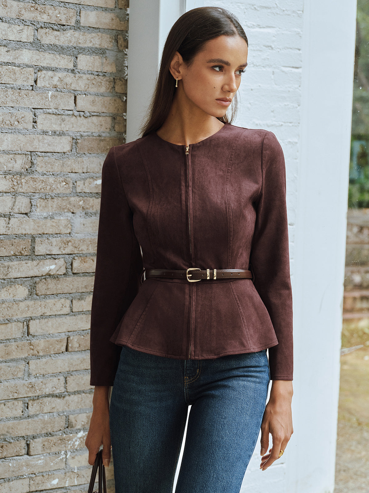 Brown fitted zip-front jacket with a slim waist belt, front view