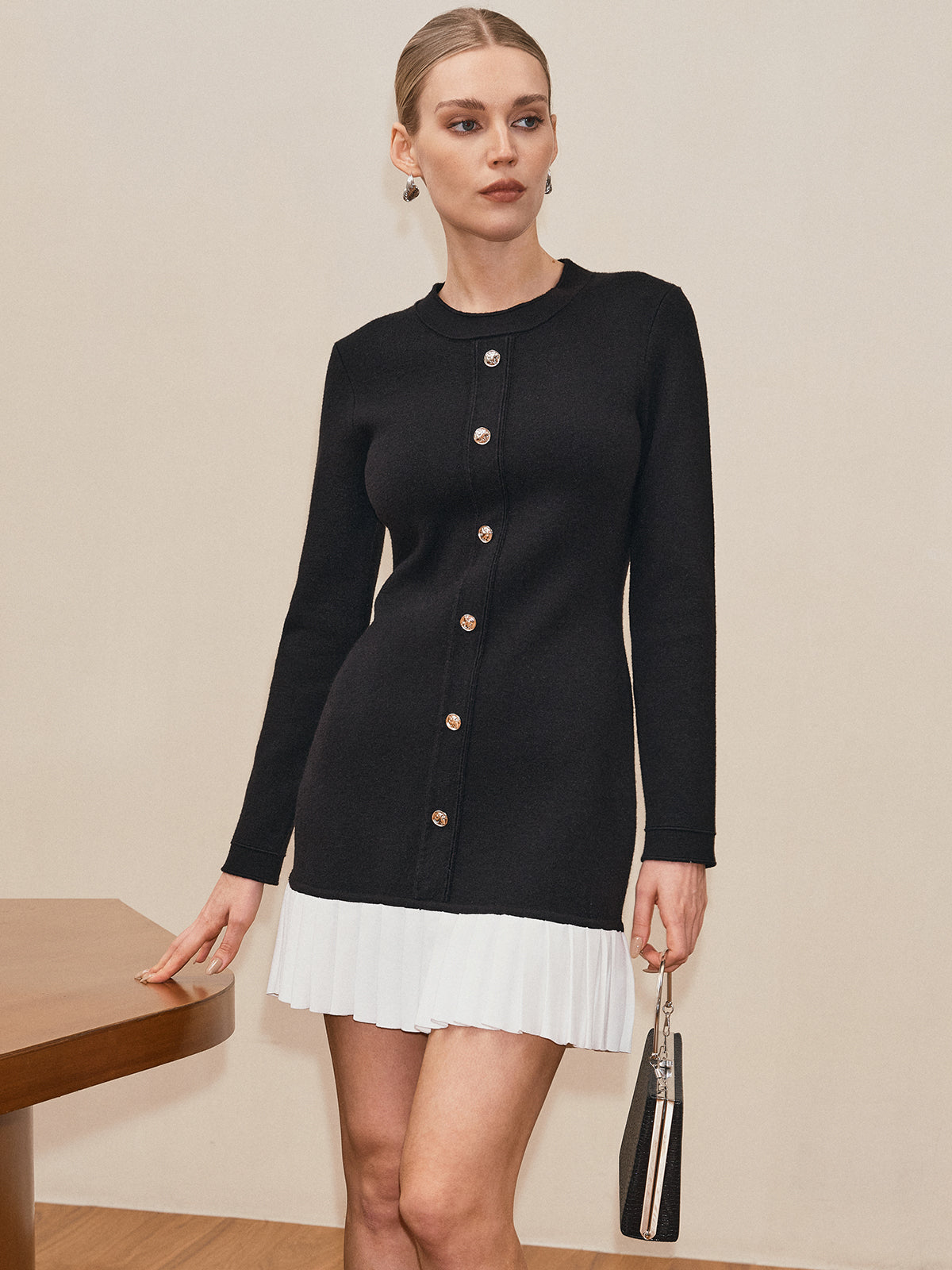 Laetitia black and white pleated hem knit mini dress, three-quarter front view