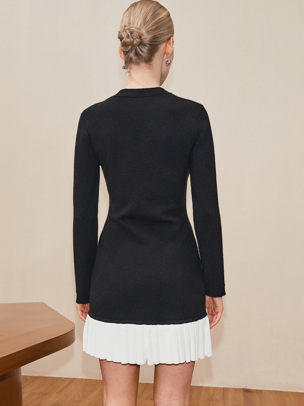 Laetitia black and white pleated hem knit mini dress, back view