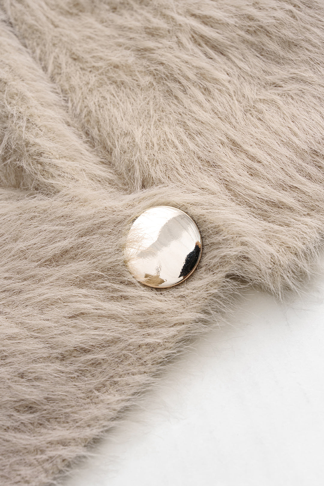 Liliane beige eyelash-knit cardigan, close-up of the domed gold button