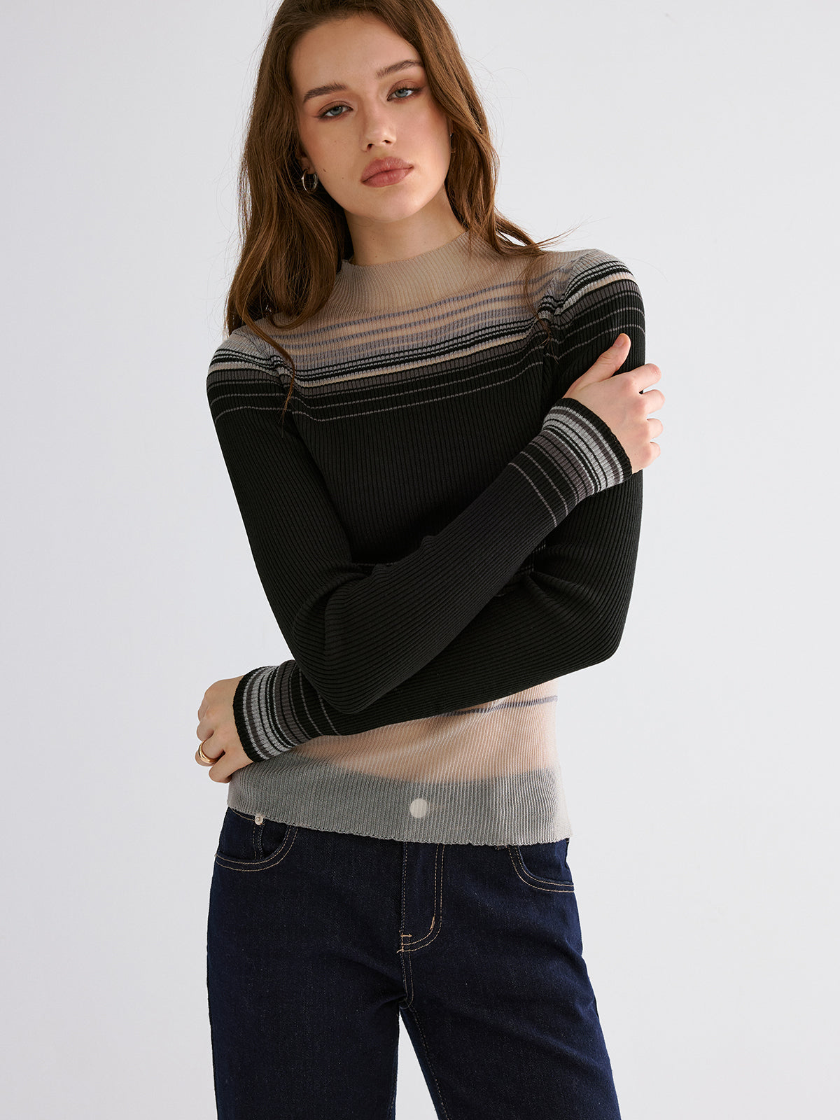 Lydie multicolor sheer ribbed knit top, three-quarter view with sleeves over the hands