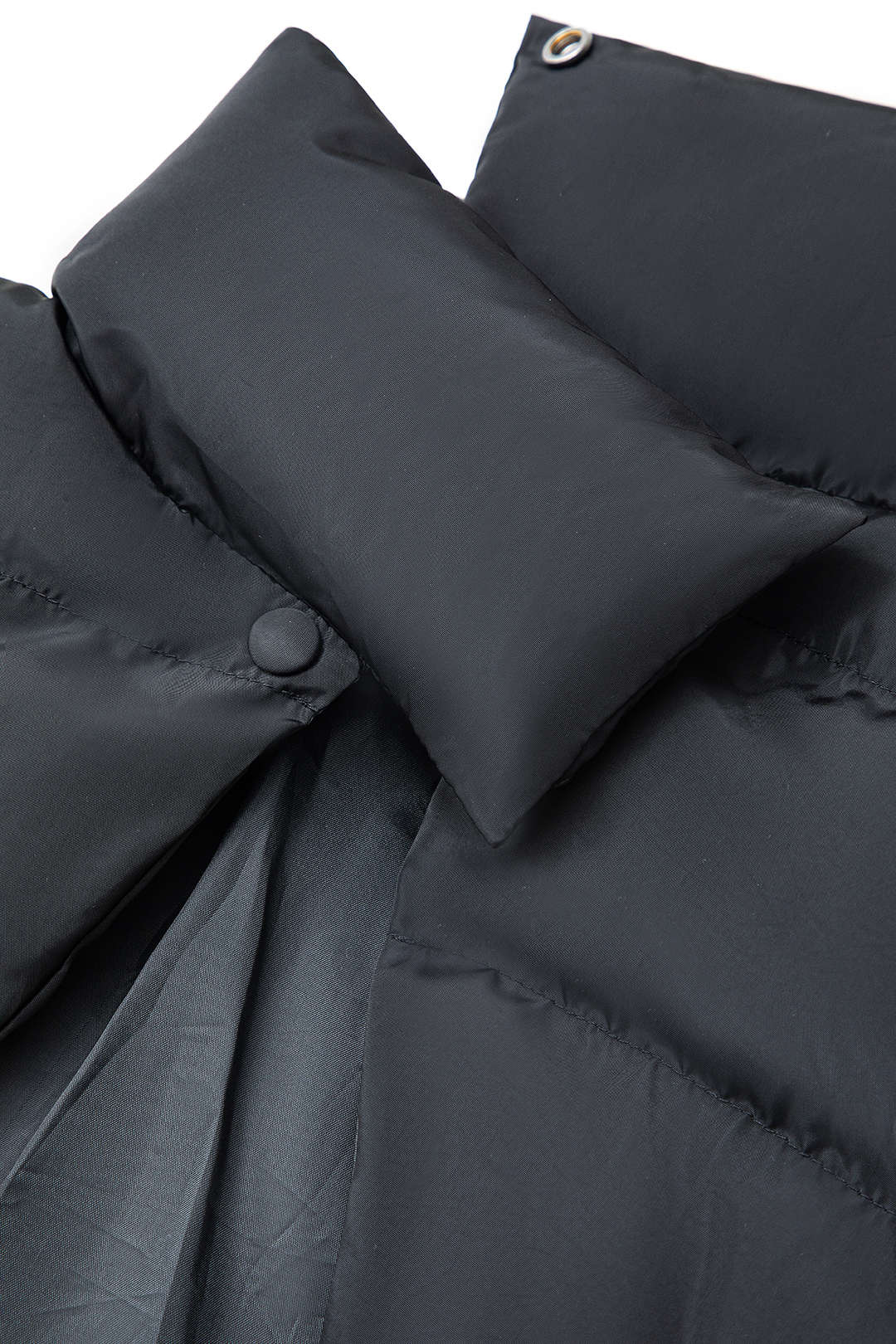 Maelle black quilted jacket, close-up of the button fastening