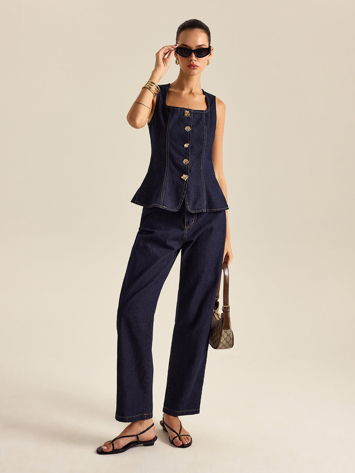Mahaut indigo denim peplum top and trouser set, full-length view