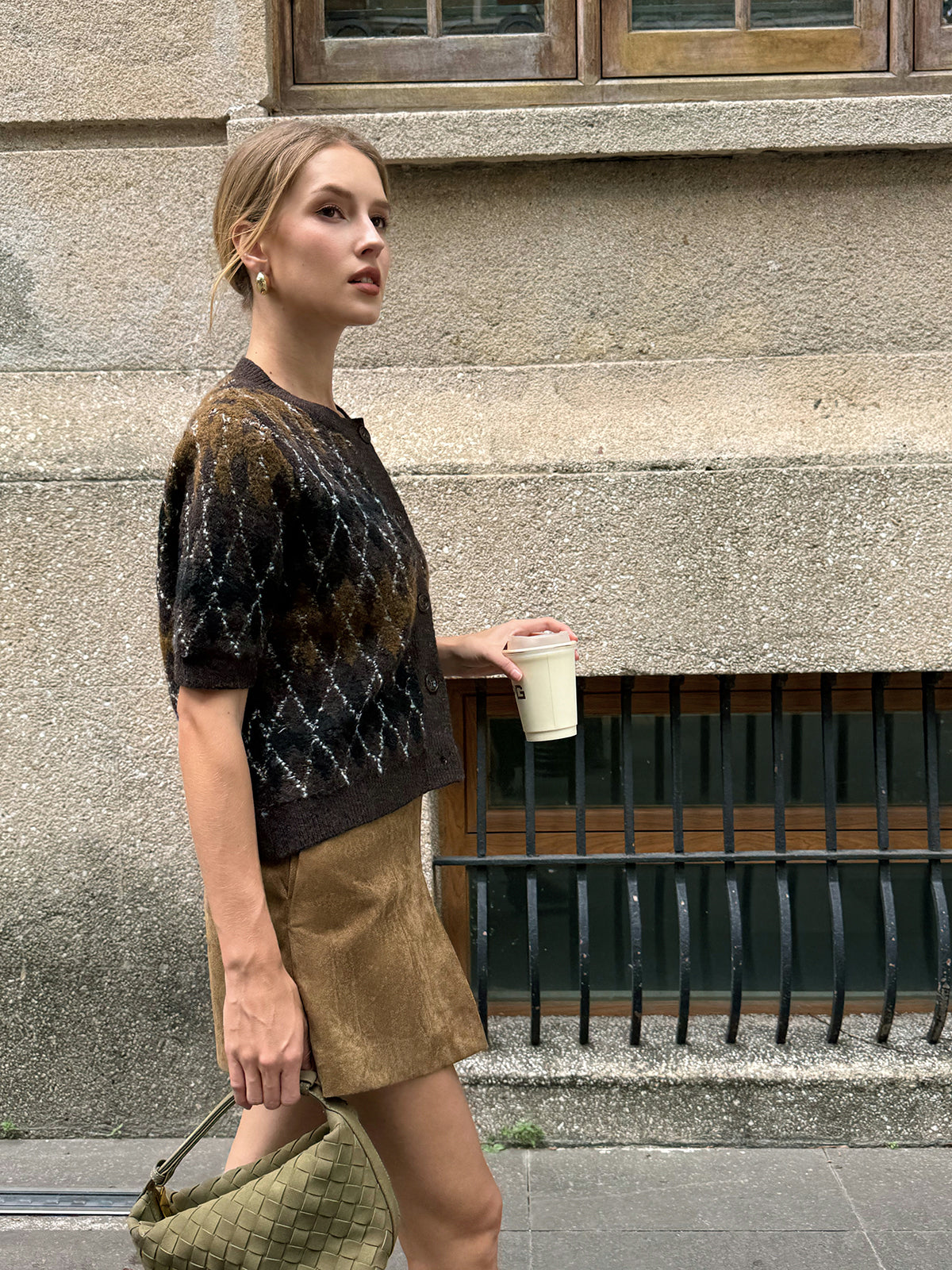 Marceline brown argyle short-sleeve cardigan, angled standing view