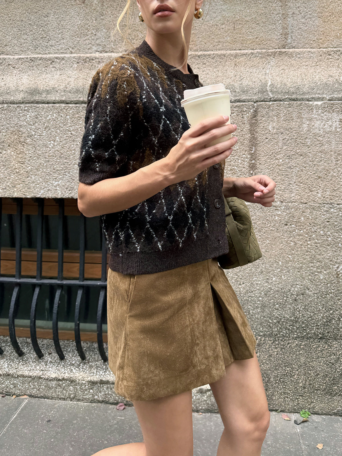 Marceline brown argyle cardigan, side view of the short sleeve and ribbed cuff