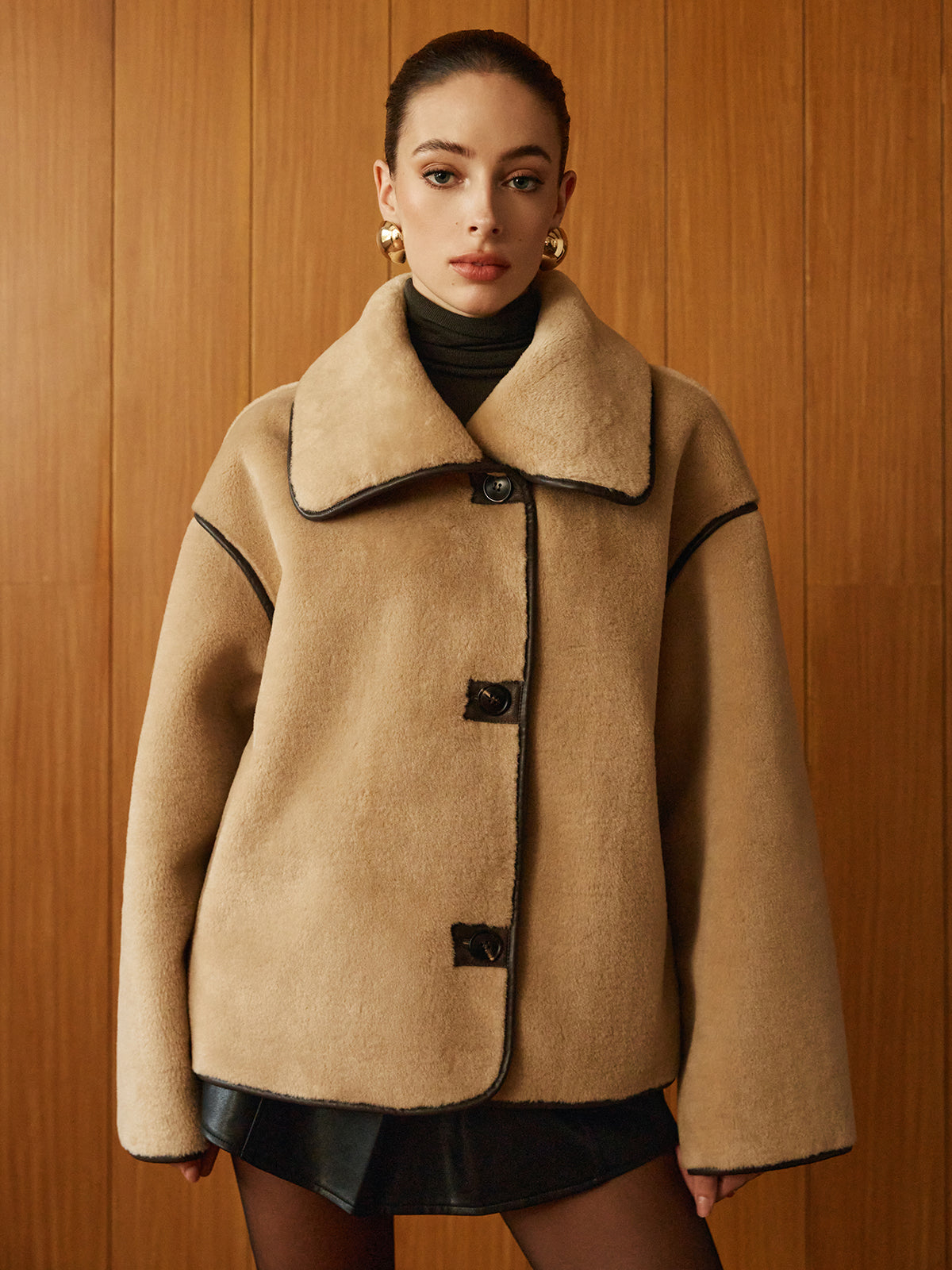 Beige oversized-collar jacket buttoned at the front, front view