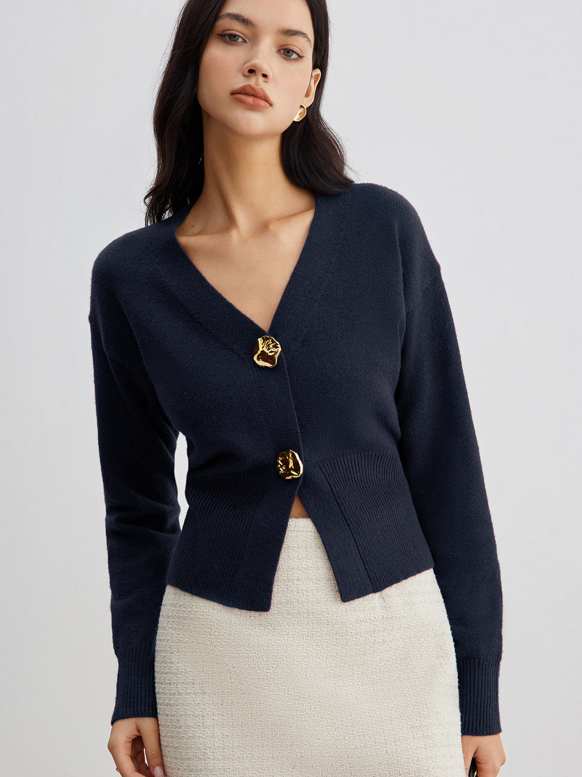 Ninon navy gold-button cropped cardigan, front view with crossover V-neck