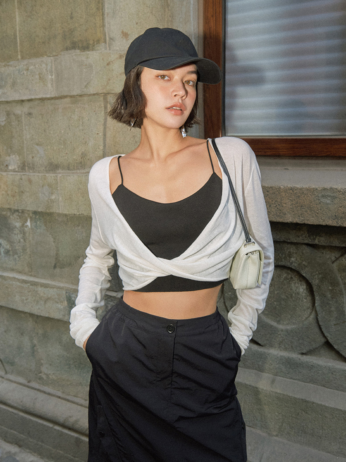 Odette white twist front cropped knit top, front view