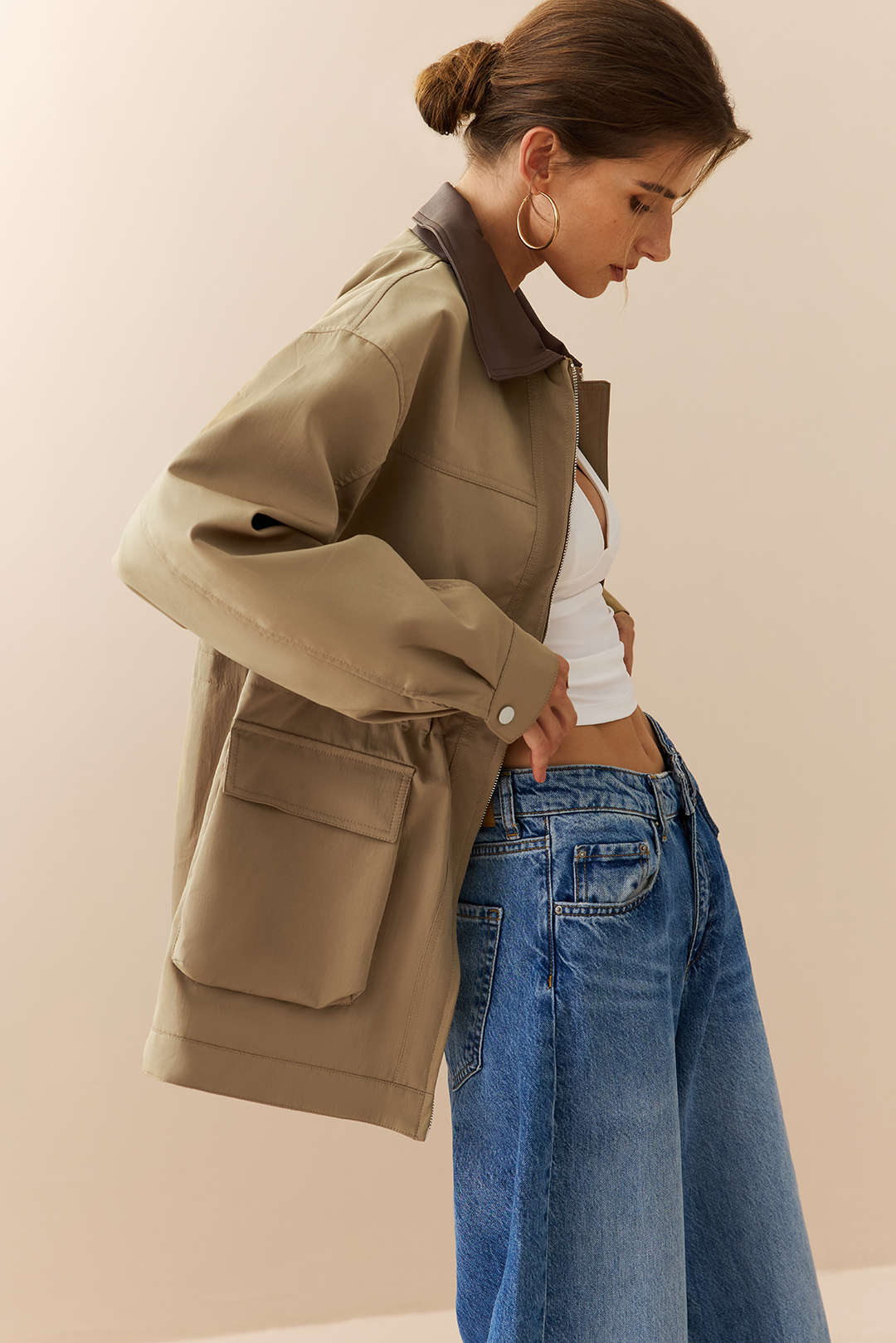 Orianne khaki contrast-collar jacket, side view showing the flap pocket