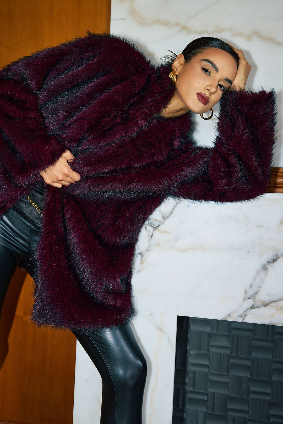 Palmyre burgundy faux fur coat showing the full sleeve