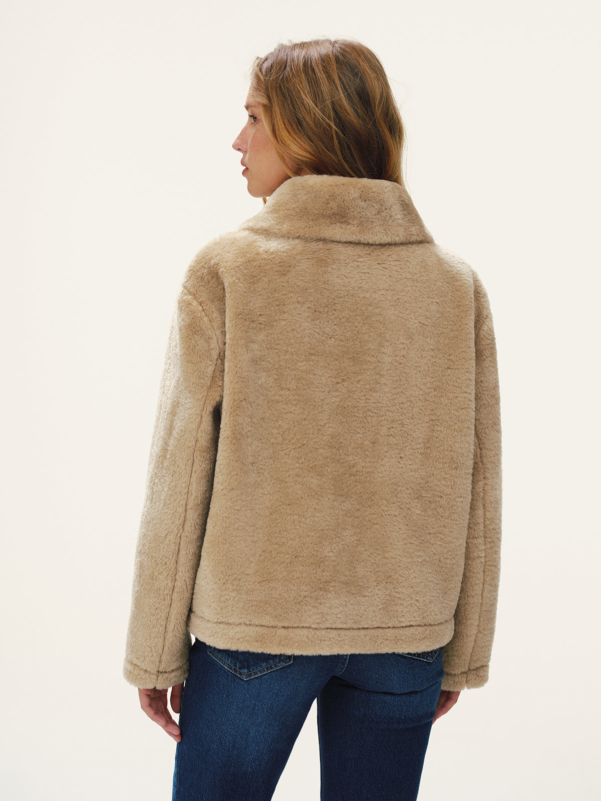 Beige plush textured jacket from the back, showing the straight cut