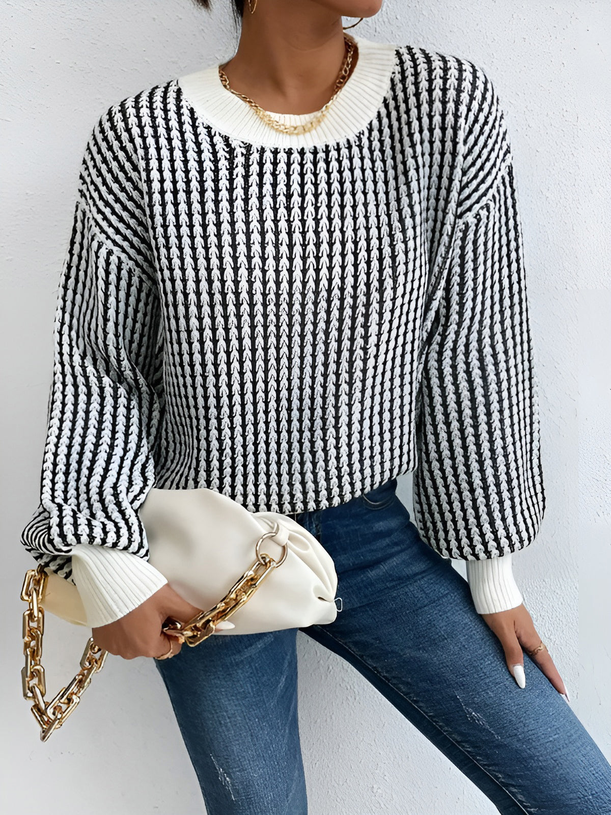 Pierrette black and white striped knit sweater, close-up of the wide sleeve and ribbed cuff
