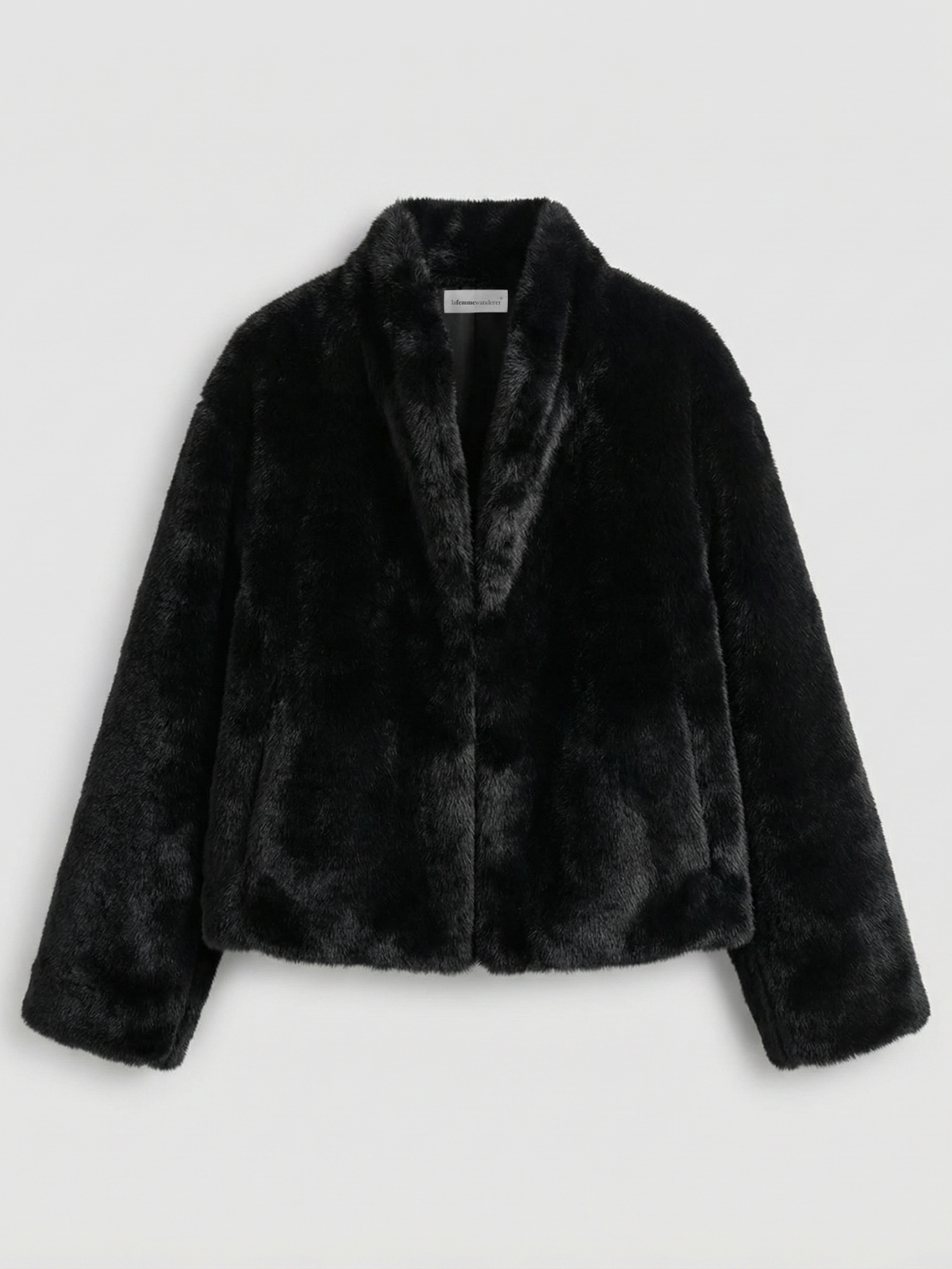 Solange black faux fur short coat shown flat, front view