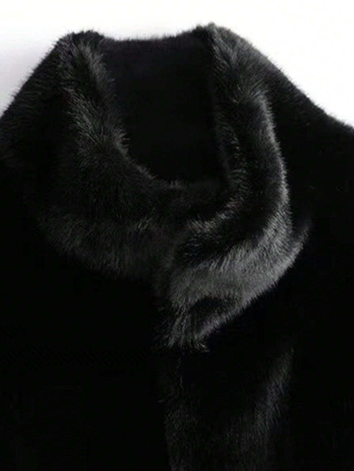 Close-up of the stand collar on the Solange black faux fur coat