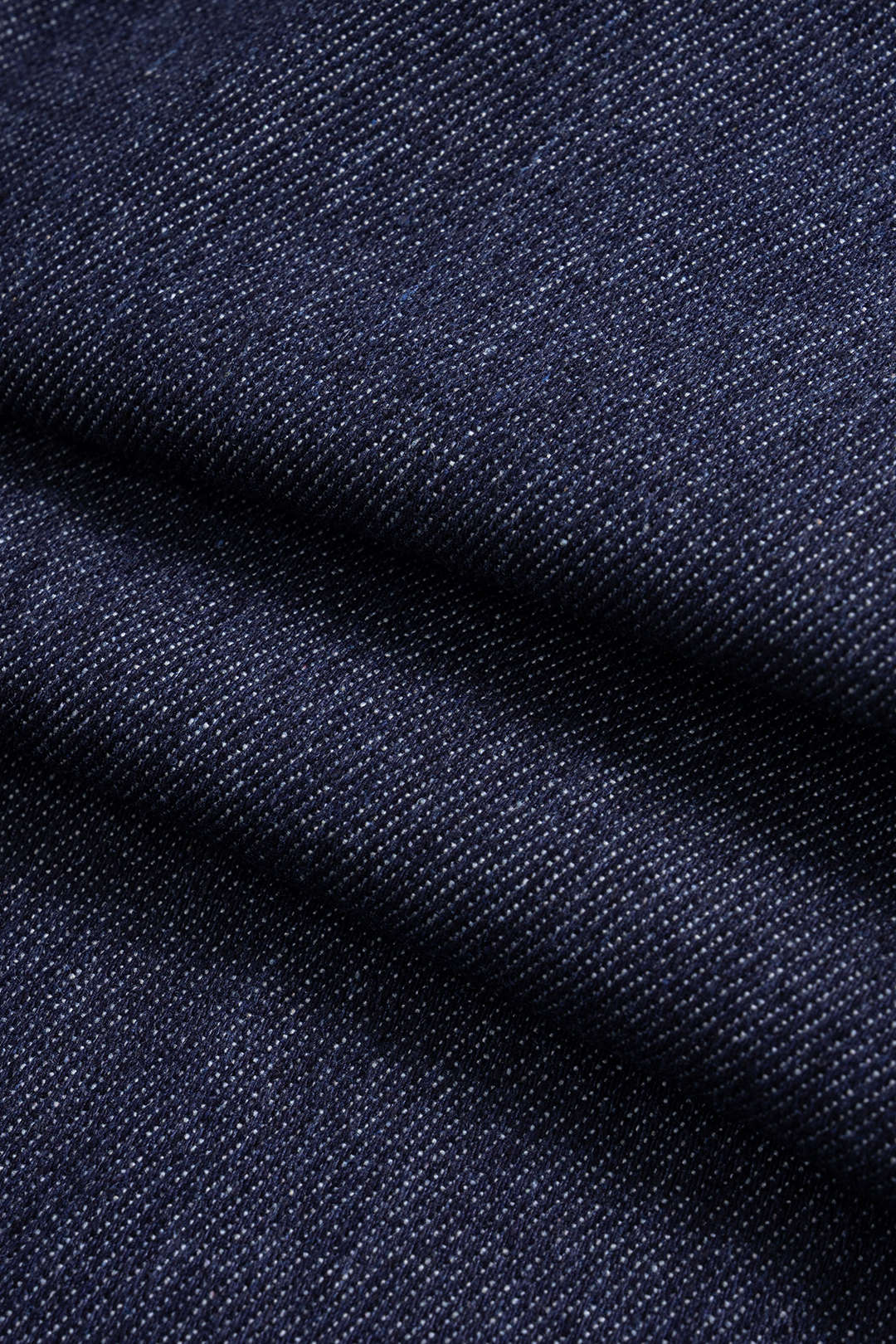 Violette navy denim jacket, close-up of the denim weave