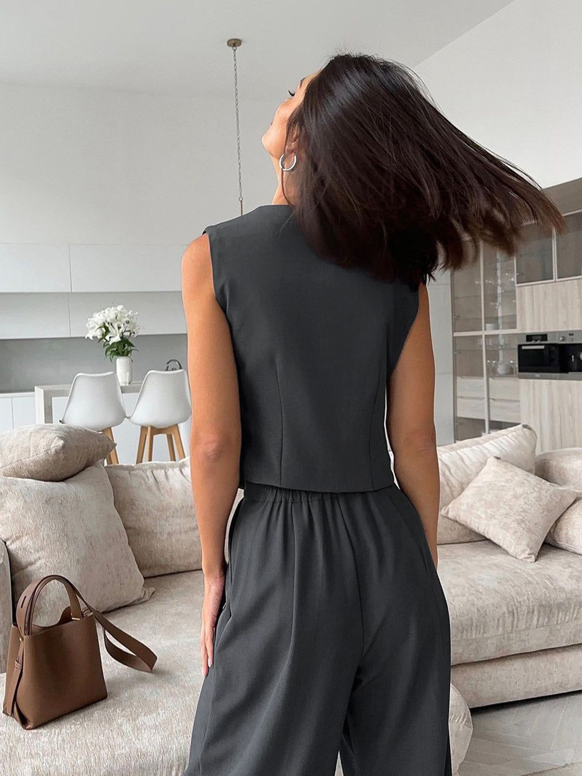 Zoe charcoal waistcoat and wide-leg trouser set, back view showing the elasticated trouser waistband